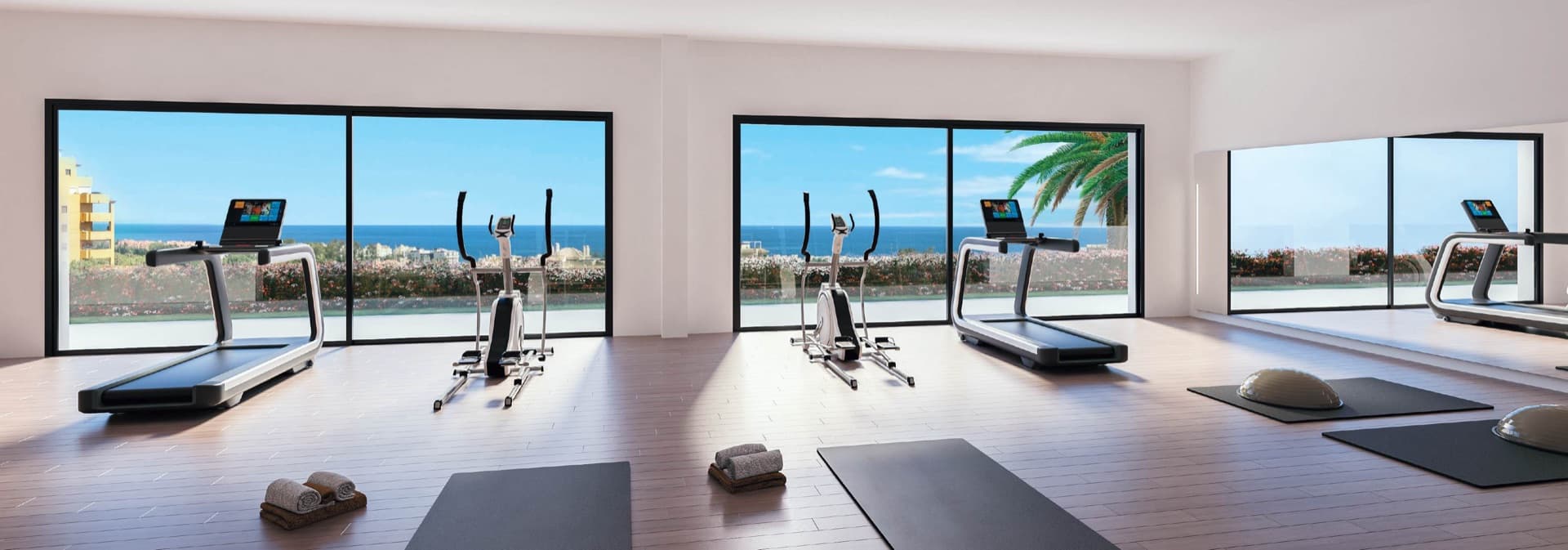 Gimnasio con vista al mar